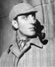 A man wearing a cap and looking left