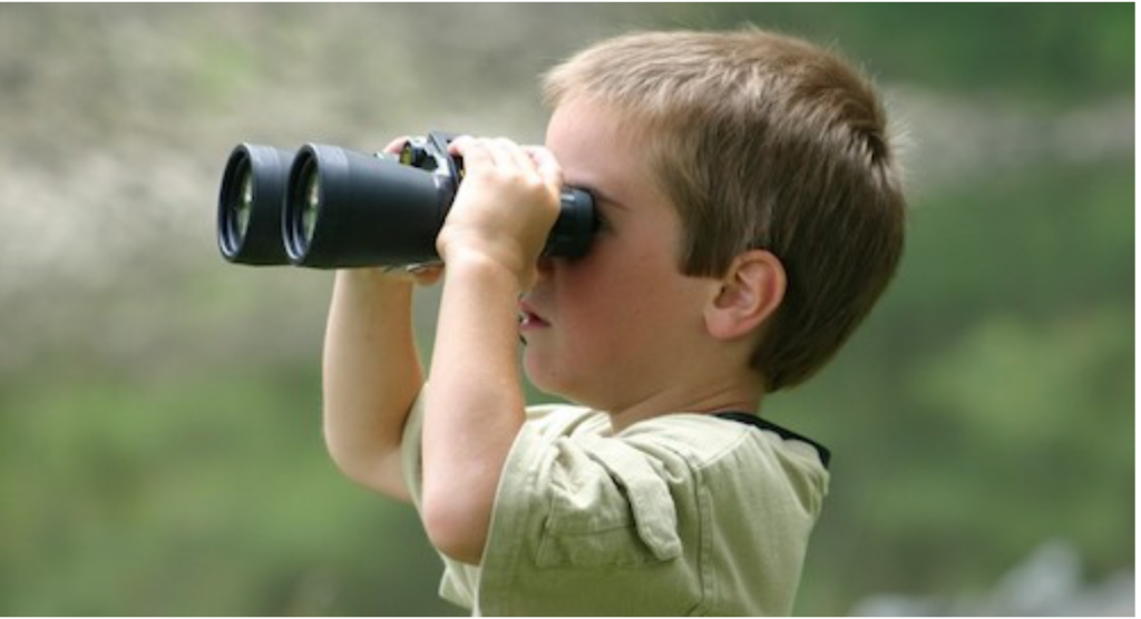 A child with binoculars