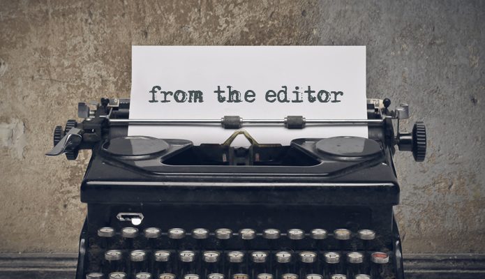 Typewriter with "from the editor" paper.