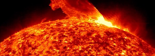 Solar flare erupting from the sun's surface.
