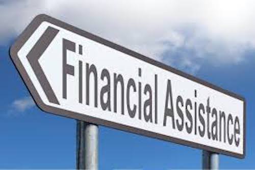 Sign pointing to financial assistance direction.