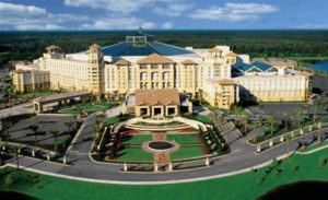 Large resort complex with landscaped entrance.