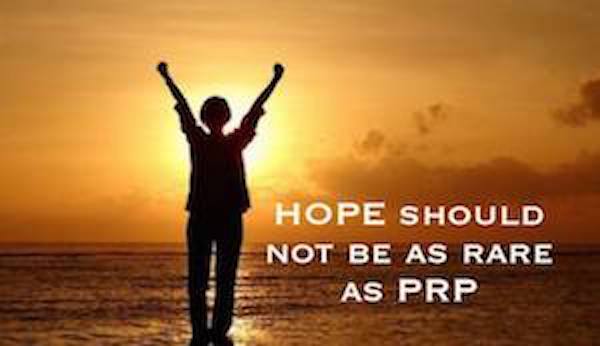Silhouette with text about hope at sunset.