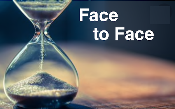 Hourglass with text "Face to Face".