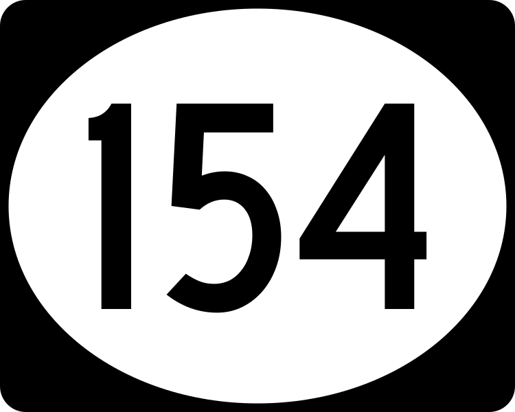 A white circle with the number 1 5 4 in it.