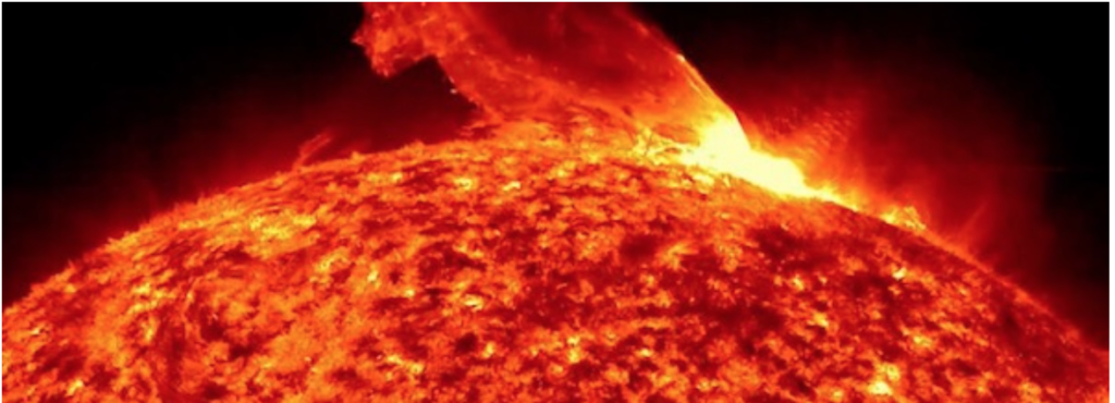 Solar flare erupting from the sun's surface.