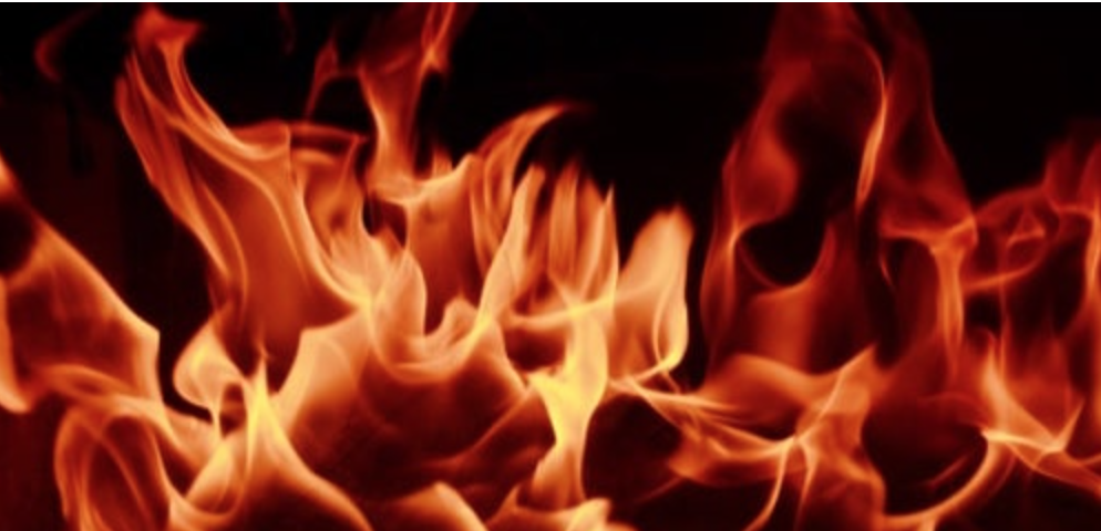 Flames burning with vibrant orange hues.